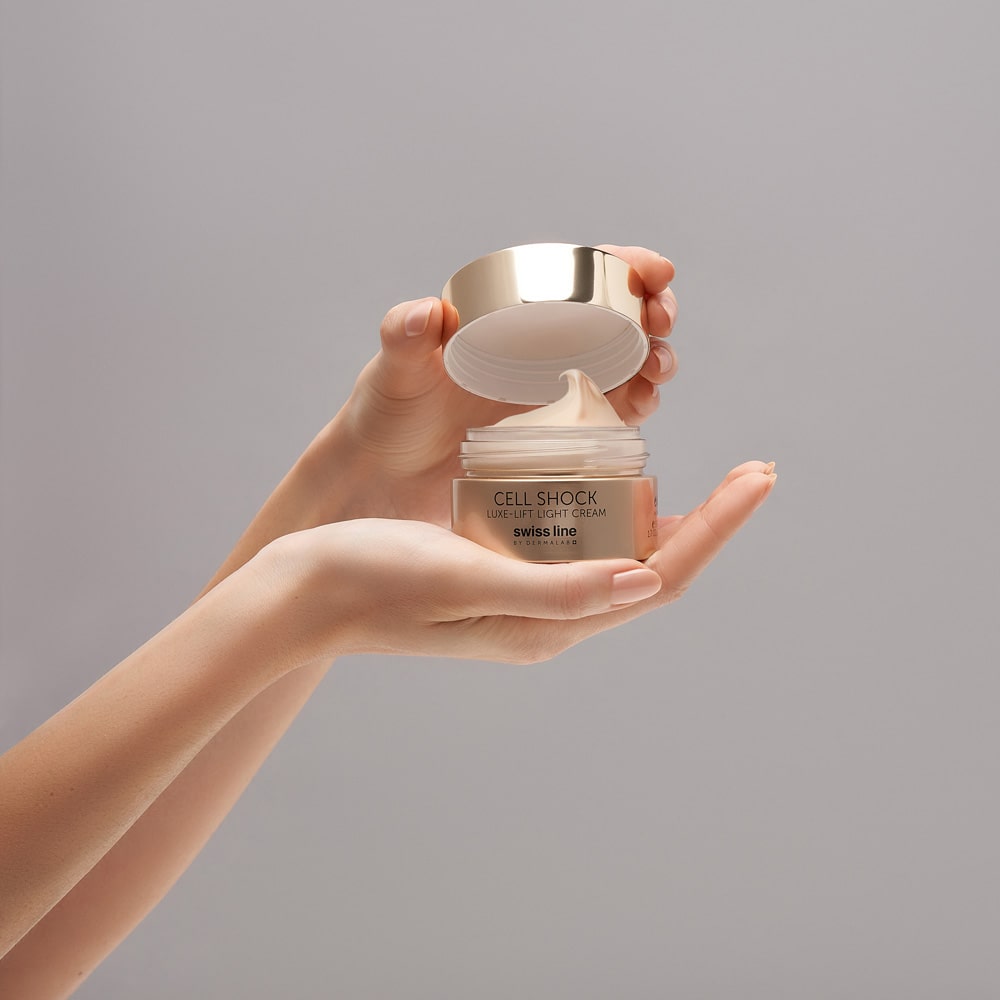 CELLSHOCK7-TCFXSwissline_Product_Hands_Luxe-LiftLightCream-min.jpg